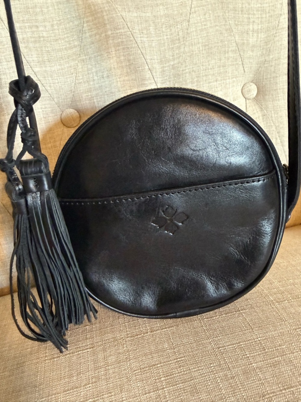 Patricia Nash Black Round Leather Adjustable Crossbody w/Tassel and Tiger Print